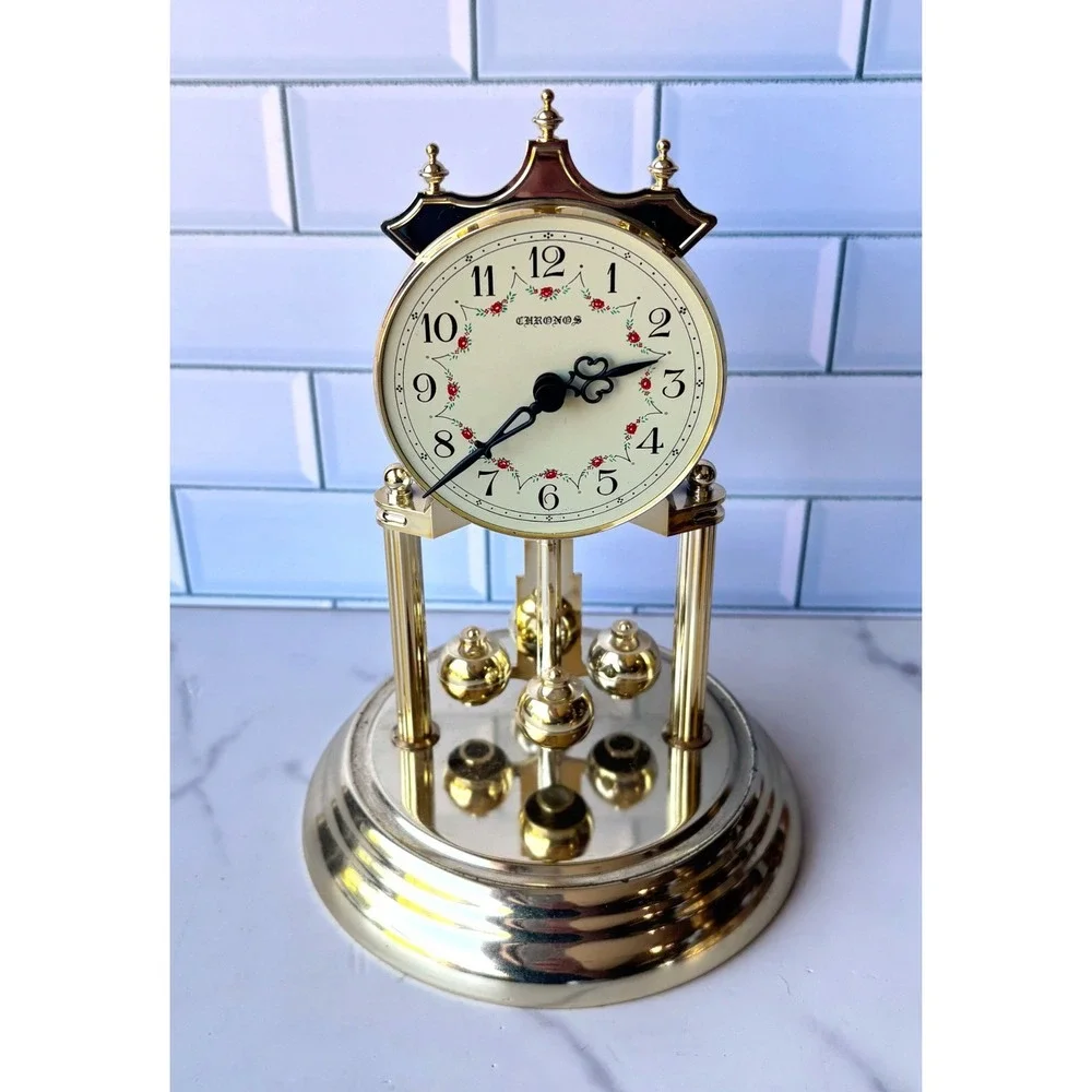 Chronos Quartz Anniversary Clock Gold Tone Glass Dome Floral Face Rotating Ball